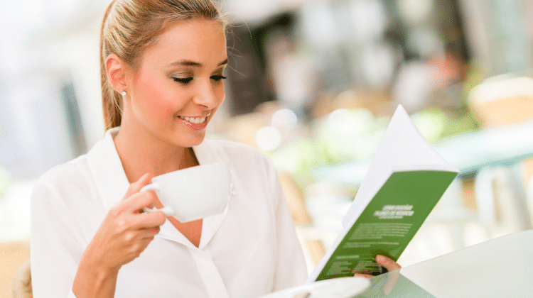 business woman reading book